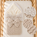 Knitted Baby Swaddle with Bow and Lace
